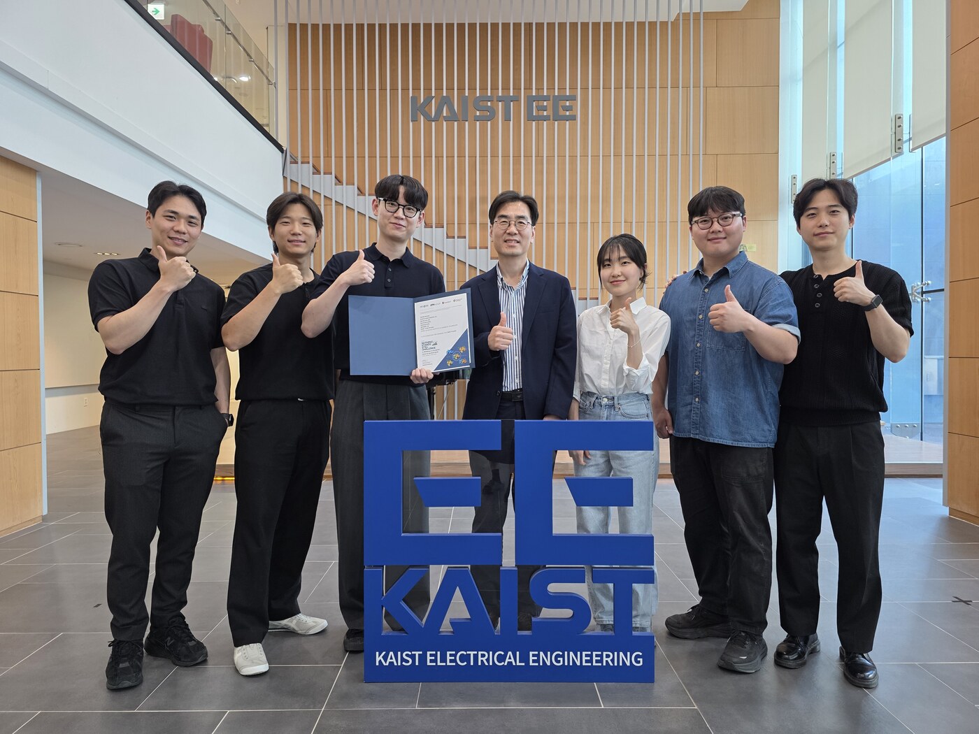 The team at KAIST EE with the certificate.
