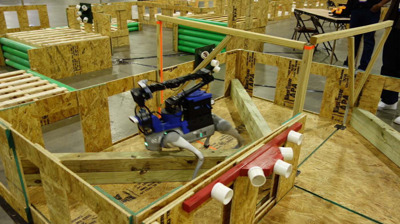 Our Go2 with a ViperX arm crossing a lane at ICRA 2025, Atlanta.